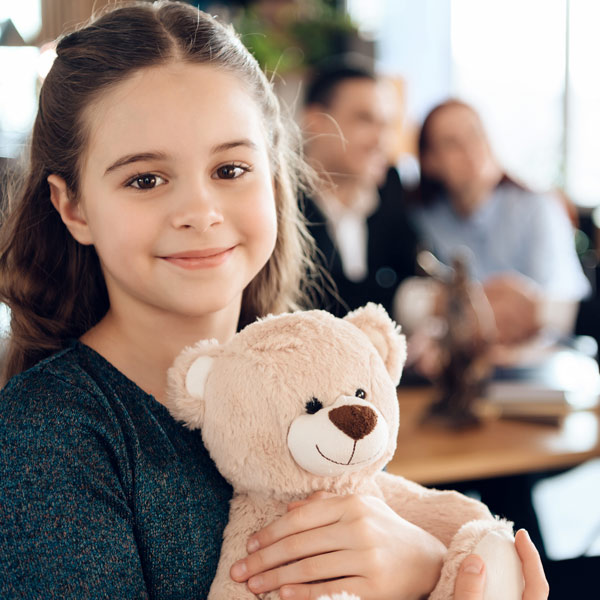 young child with teddy bear